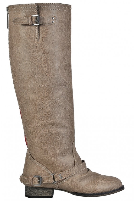 Riding boots with red zipper top in back