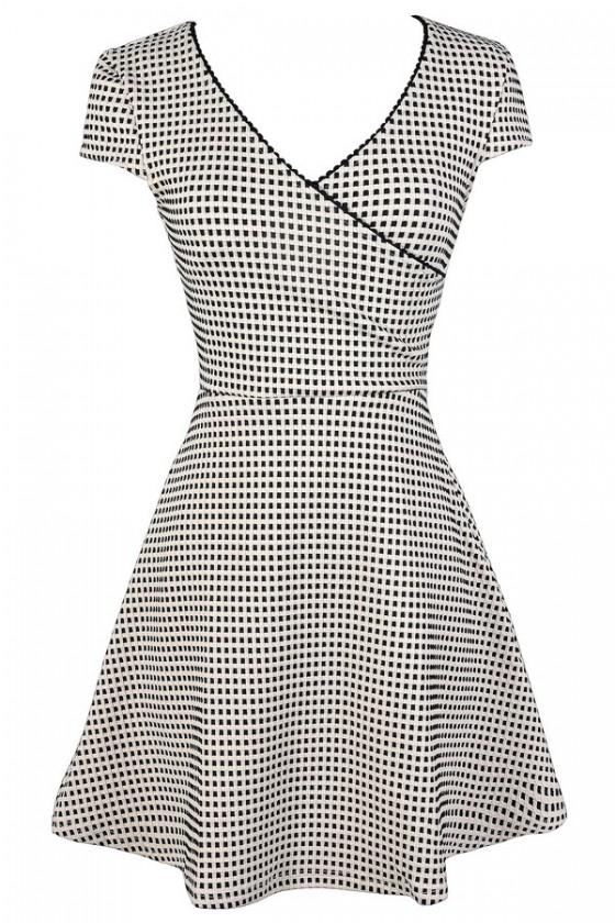 White dress shop with black lines