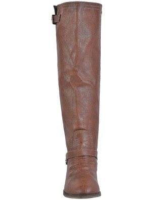 tan boots with red zipper