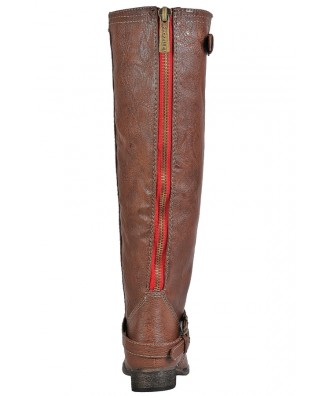 tan boots with red zipper